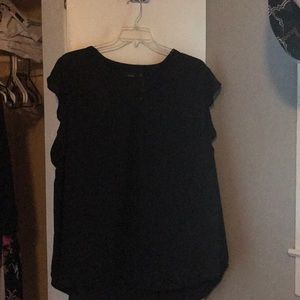 Black ruffle cap sleeve blouse.